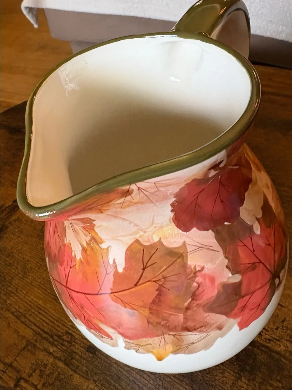 Source Unknown White Ceramic Pitcher with Red and Brown Leaf Motif